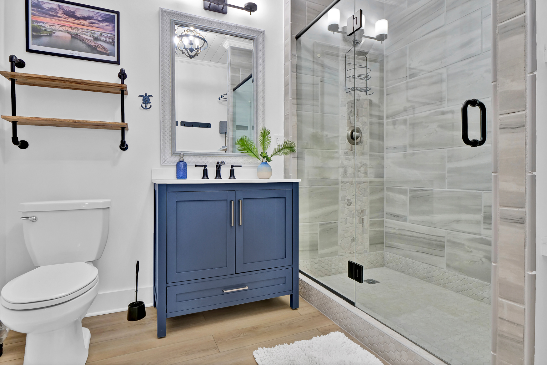 Full bathroom with shower and clean finishes
