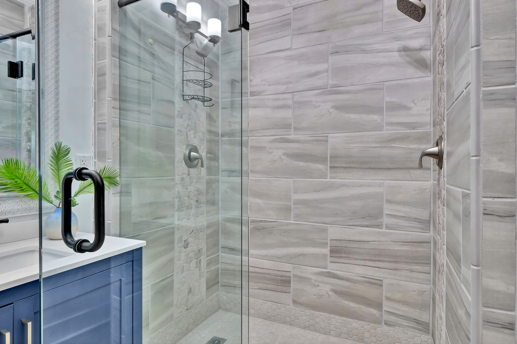 Studio bathroom with modern fixtures and bright lighting