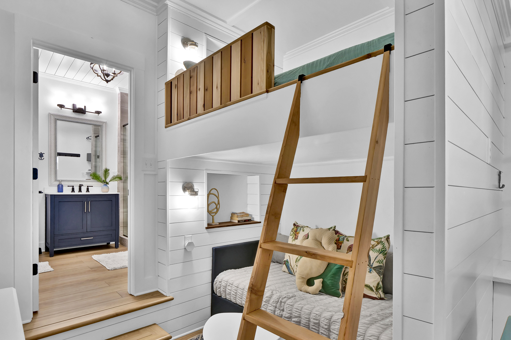 Lofted queen bed and built-in daybed in Sand Before Time