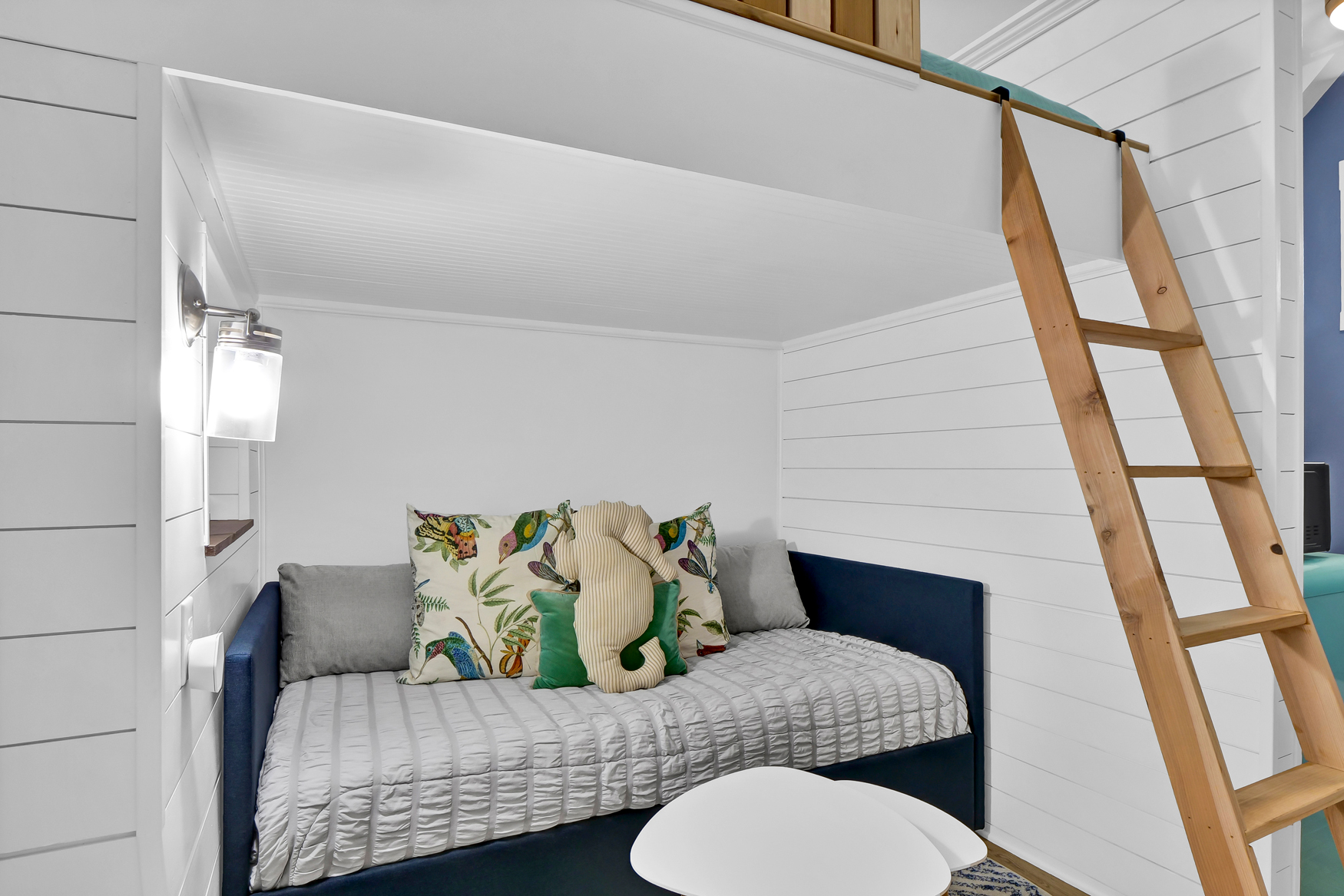 Cozy studio sleeping layout with coastal accents